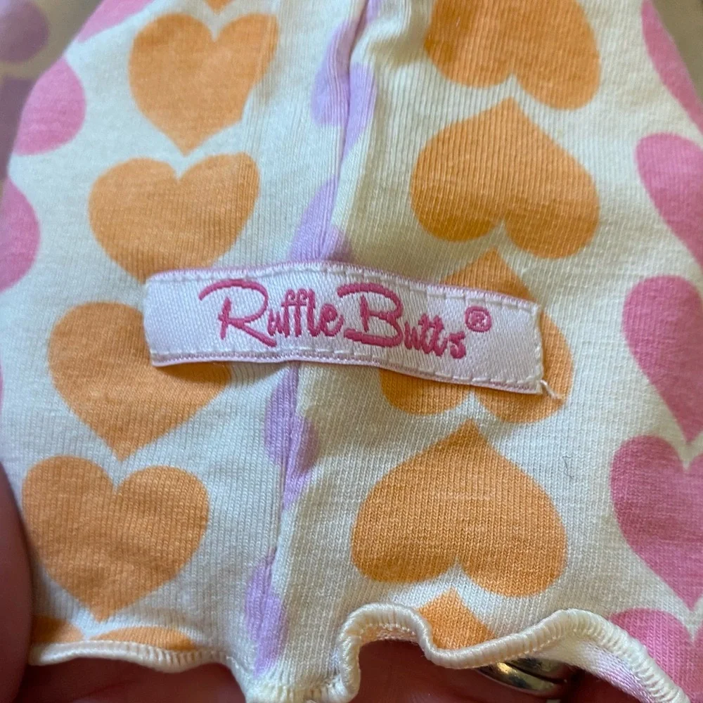 NWT RuffleButts Rainbow Heart Snuggly 2-Piece Ruffled Short Sleeve Pajamas, 0-3M